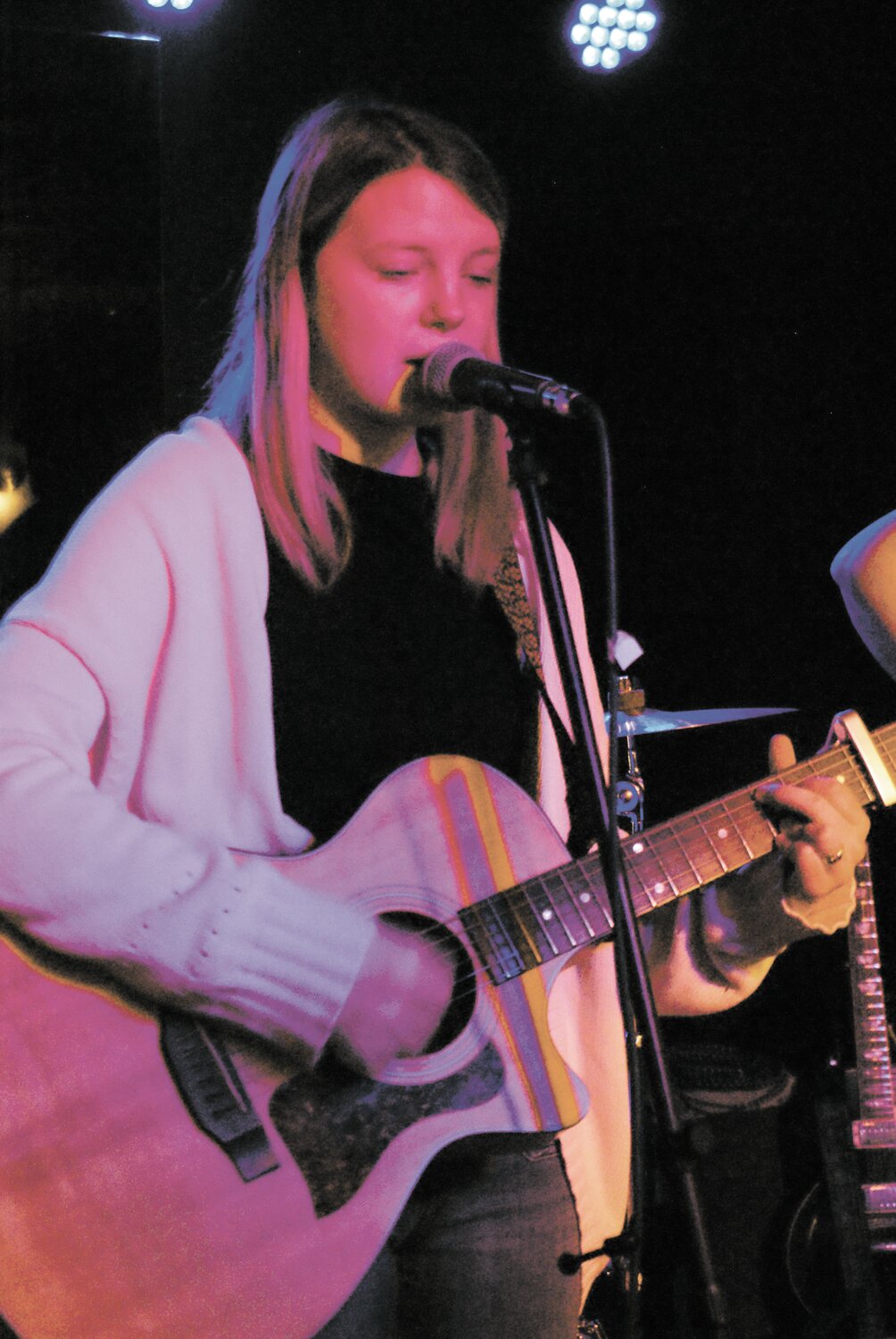 BERKLEE BOUND: Jane Kristiansen (18) a singer-songwriter from J&W School for the Arts got up to the mic. She will attend Berklee college of music in Boston next year. (Photos by Steve Popiel)